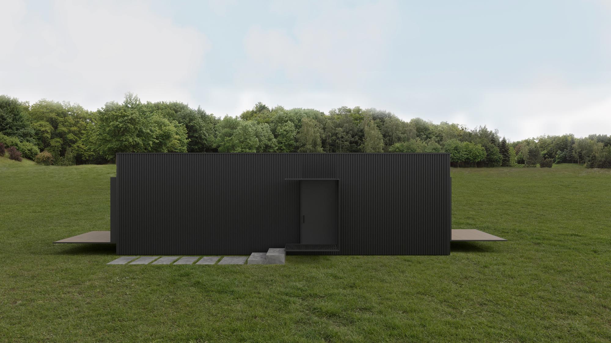 Render of the back of the nHouse module: a dark, compact volume on the lawn, with the front door