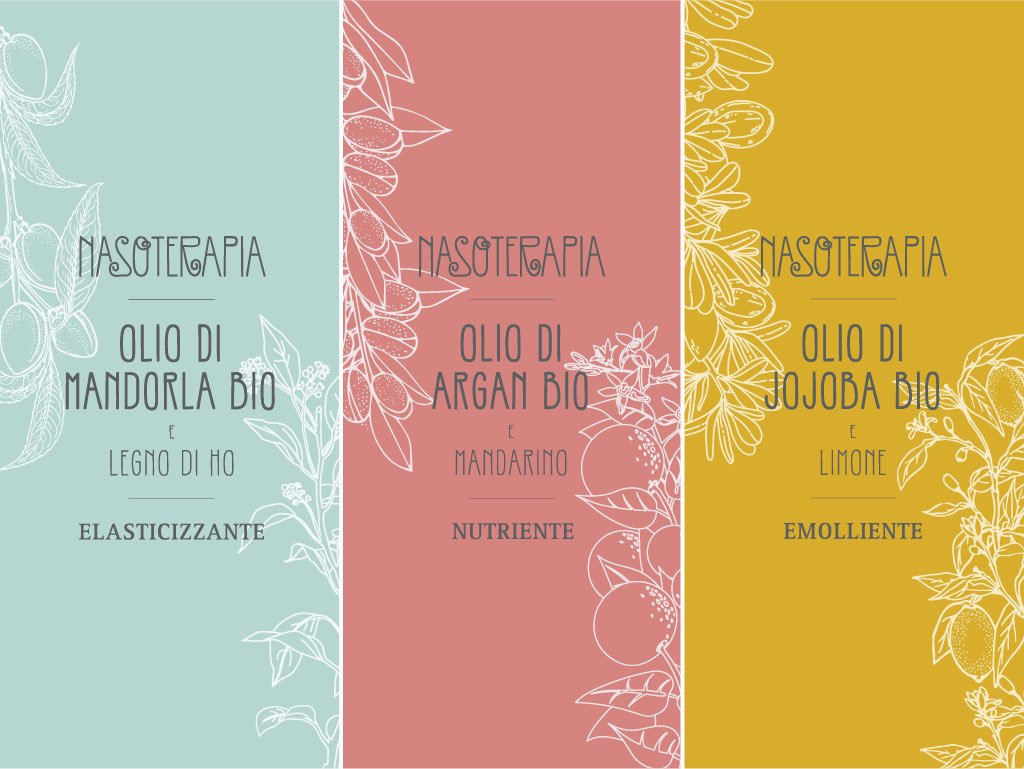 Le tre etichette dei Duetti Nasoterapia affiancate: mandorla e legno di Ho su fondo acqua, argan e mandarino su fondo rosa, jojoba e limone su fondo ocra